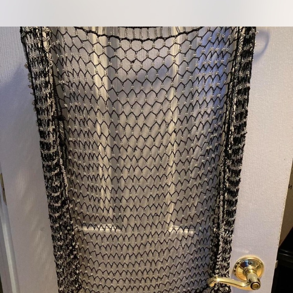 Cute! Black crochet vest with silver beads